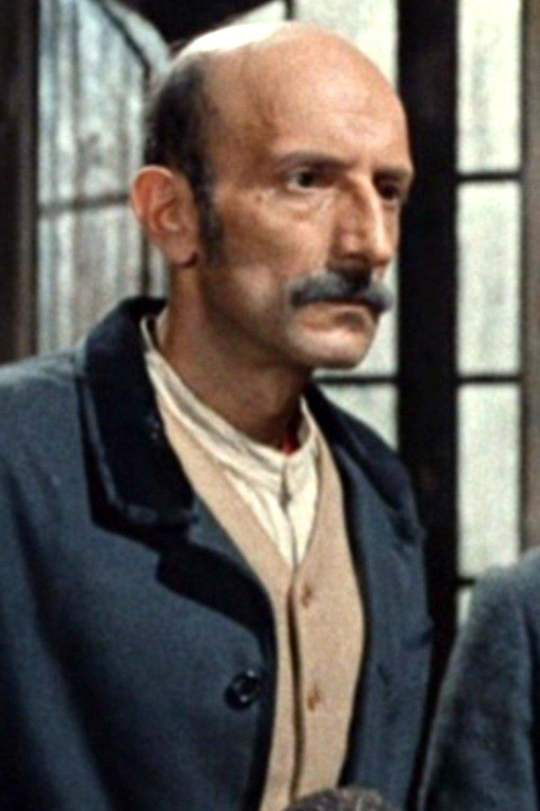 Passerby who calls the Police (uncredited)