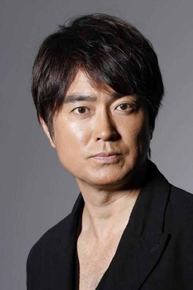 Kei and Tomo's Father (voice)